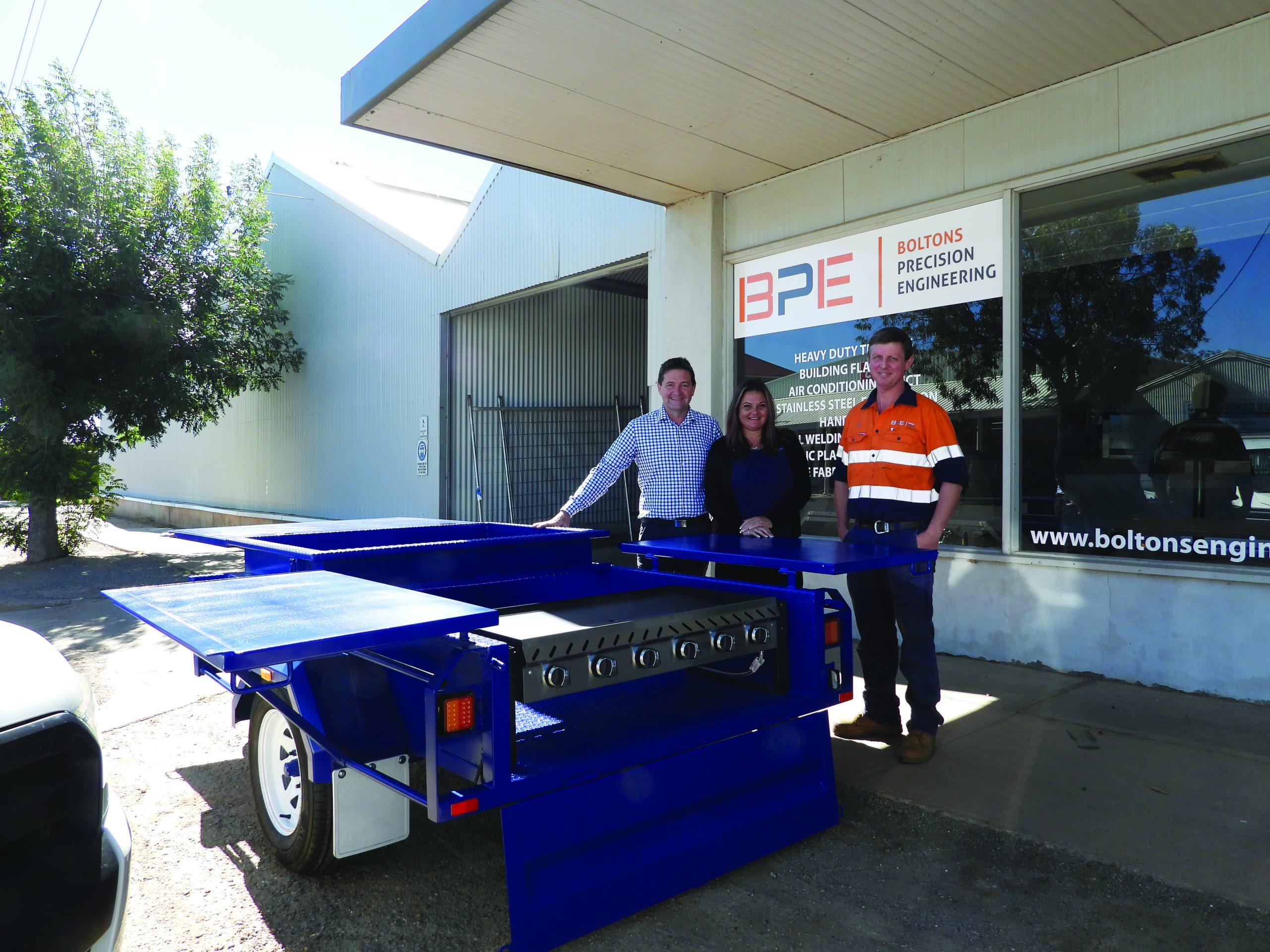 Mayor Tom Kennedy and Jamie Bolton officially handing over the trailer to Ms Carswell. PICTURE: EVE-LYN KENNEDY