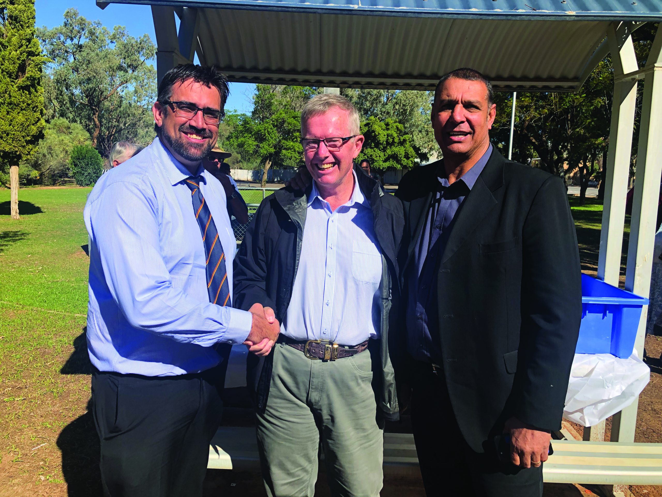 Federal Member for Parkes Mark Coulton (centre) with REDI.E Programs Manager Michael Cooper and General Manager Peter Gibbs.