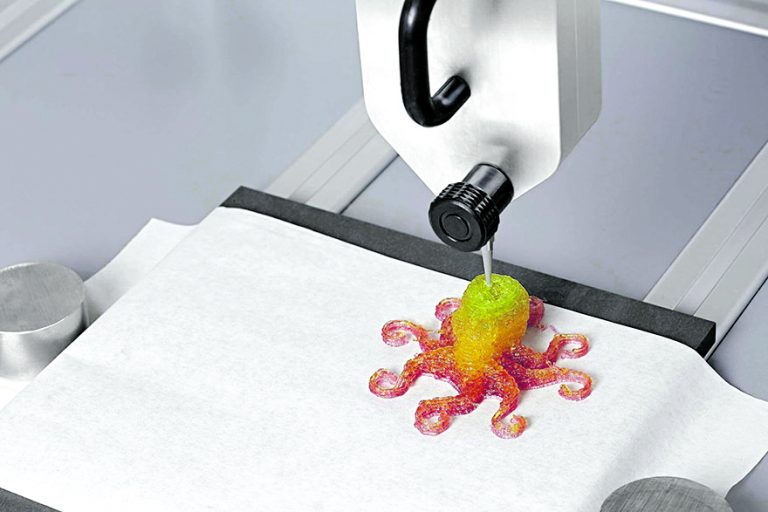 A 3D printer creating a lolly in 2015 by waiting for each layer to dry. PICTURE: MAGIC CANDY FACTORY