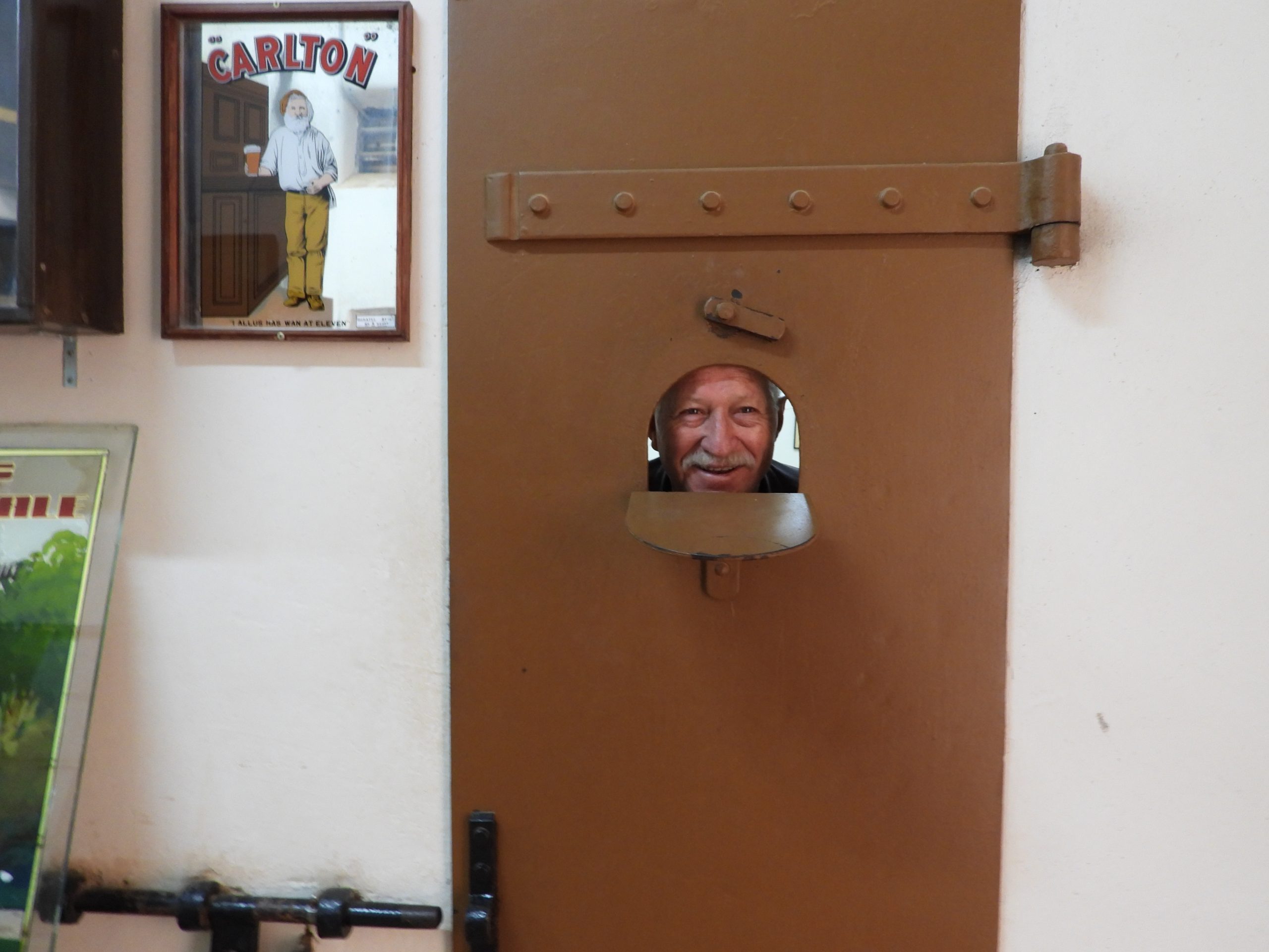 Ross Wecker looks out from behind a cell door. PICTURE: EVE-LYN KENNEDY