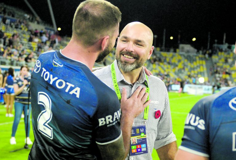 Kyle Feldt of the Cowboys with coach Todd Payten during the NRL Round 7 match.