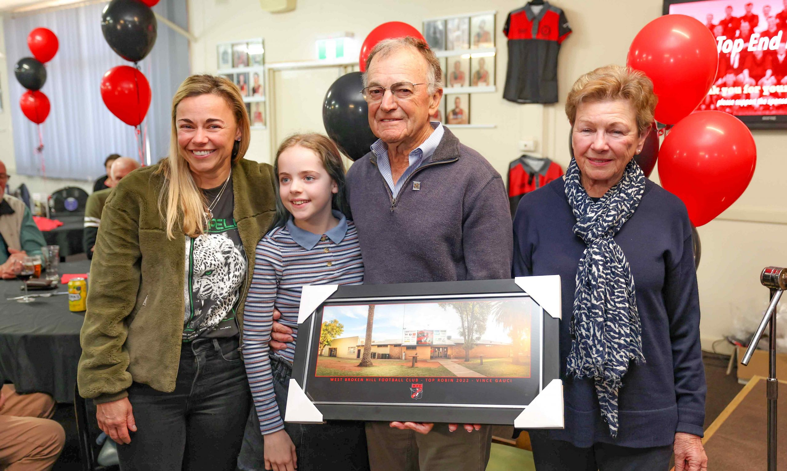 Vince Gauci with his family (daughter, granddaughter and wife).