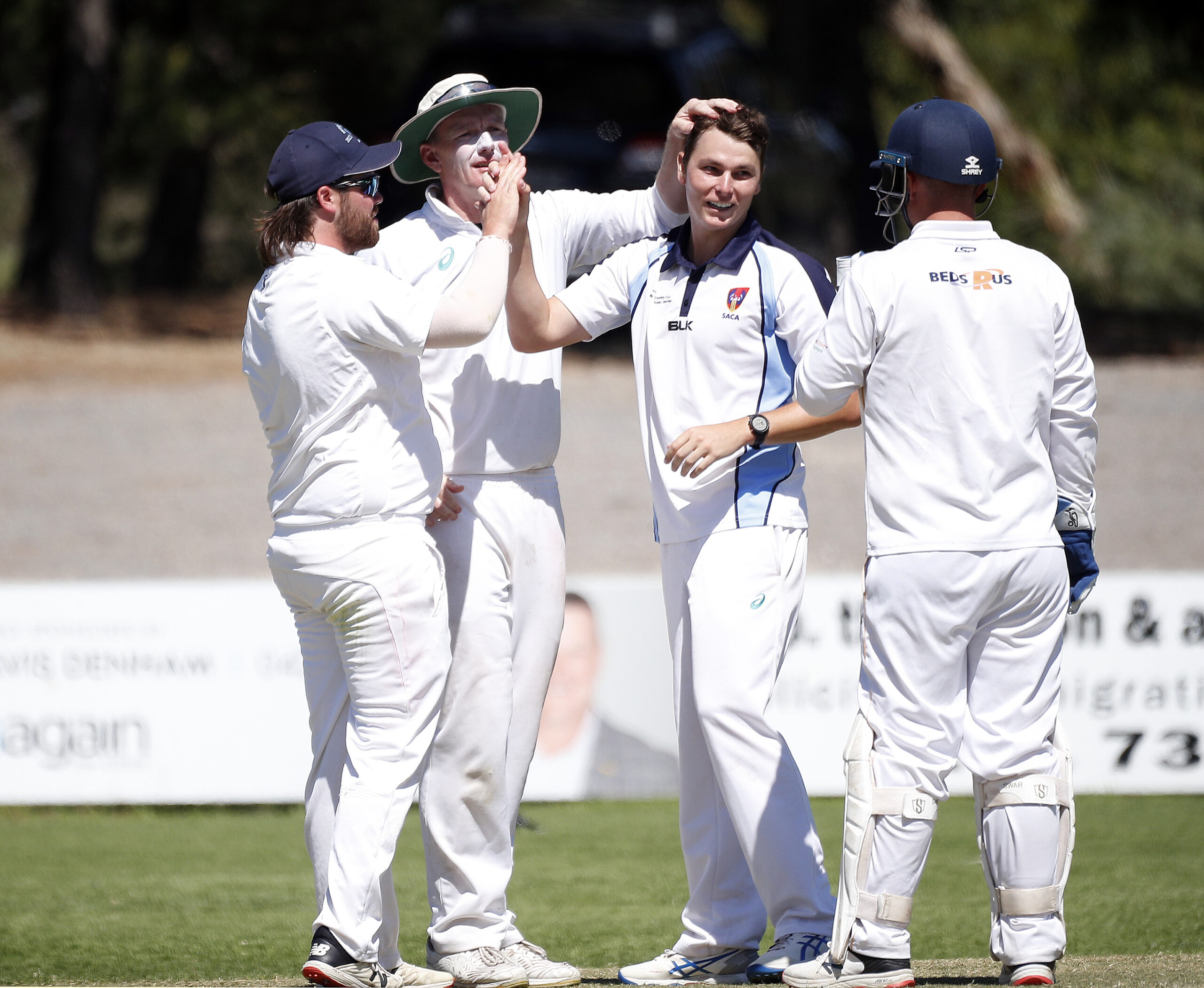 Ben Jurd being congratulated after another wicket on Wedensday